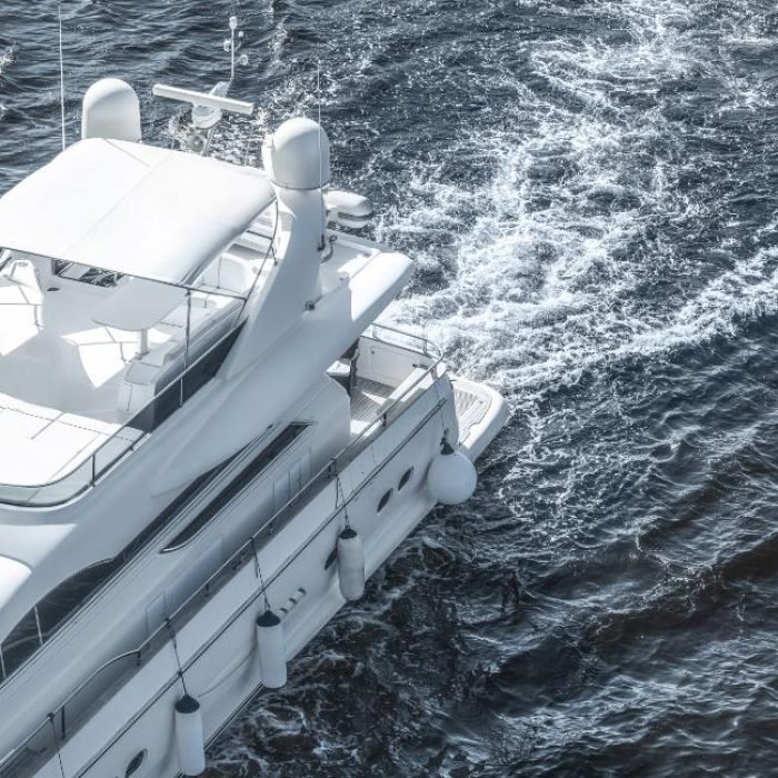 white-ship-sailing-on-blue-ocean-2022-12-16-16-16-06-utc-1.jpg